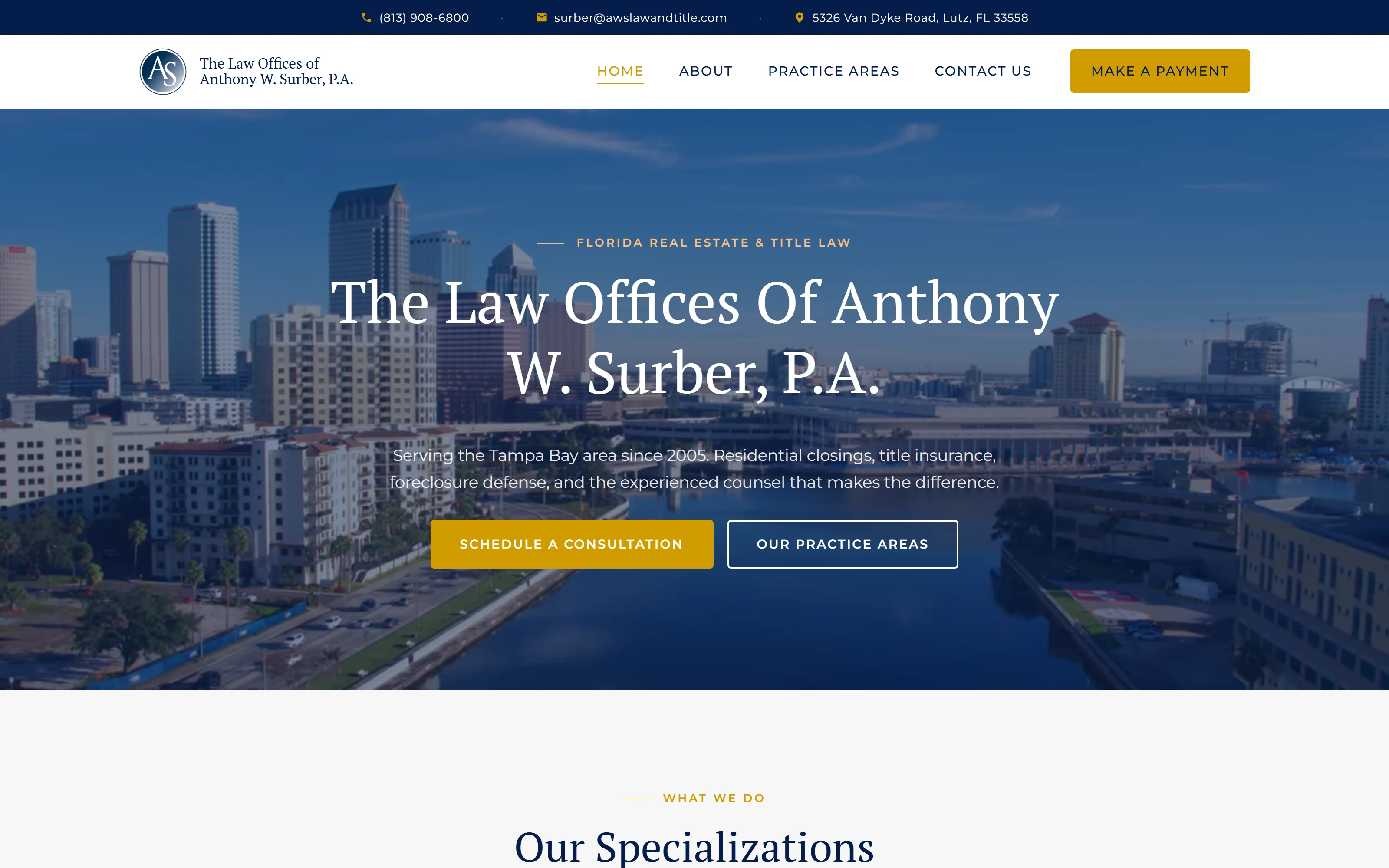 Law Offices of Anthony W. Surber website hero: the Tampa skyline behind the firm name and Florida real estate and title law